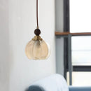 Axyaa Amber Glass LED Pendant Light: Japanese Style Wood Copper Cap Hanging Lamp