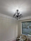 Axyaa Elegant Metal Chandelier with Crystal Pendants for Home Decor