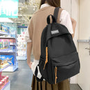 Axyaa Waterproof Nylon Teen Backpack, Black Fashion Schoolbag for Girls and Women.
