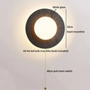 Axyaa White Glass Ball LED Wall Sconce Black Travertine Light Fixture