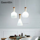 Axyaa Glass Bottle Pendant Lights: Modern LED Hanging Lamp for Home Kitchen Dining Decor