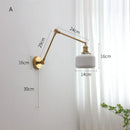 Axyaa Copper Swing Arm LED Wall Sconce Up And Down Ceramic Lampshade