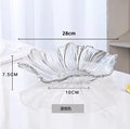 Axyaa Melon Seed & Fruit Plate Set on Crystal Glass Coffee Table