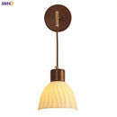 Axyaa Adjustable LED Wall Light Fixture with Ceramic Wood Base