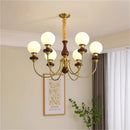 Axyaa Glass Ball Metal Arm Chandelier for Elegant Spaces