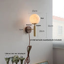 Axyaa Globe White Glass LED Wall Sconce Copper Base Mirror Light