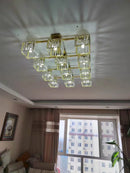 Axyaa Modern Living Room K9 Glass Pendant Lamp artfully enhances your space