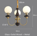 Axyaa Glass Ball Metal Arm Chandelier for Elegant Spaces