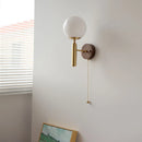 Axyaa Globe White Glass LED Wall Sconce Copper Base Mirror Light