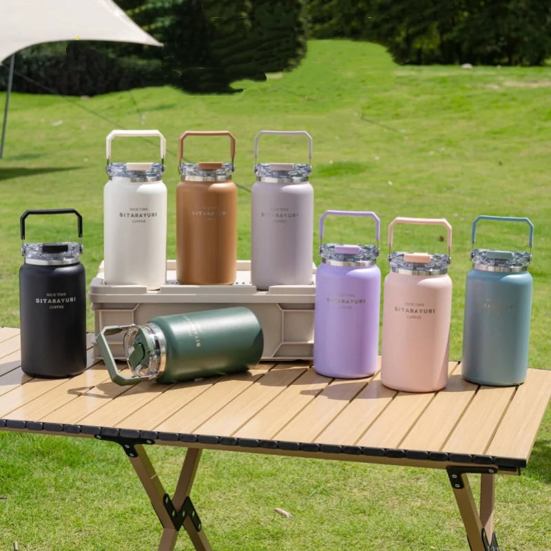 Axyaa Stainless Steel Vacuum Flask Insulated Cup with Handle, Straw, Cold&Hot Thermos Mug.