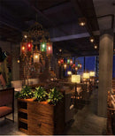 Axyaa Retro Bronze Iron Chandelier with Colorful Glass Lighting