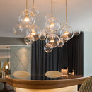 Axyaa Cute Ball Chandelier: Creative Spherical Pendant Light for Bedroom, Restaurant, and Shop.
