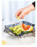 Axyaa Melon Seed & Fruit Plate Set on Crystal Glass Coffee Table