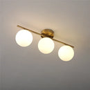 Axyaa Round Glass Wall Lights | Dual & Triple Head for Bedroom, Bathroom