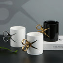Axyaa Scissor Handle Coffee Cup with Camellia Flower Design