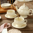 Axyaa Ceramic Gold Painted Tea Cup Set glamorizes afternoon tea styling