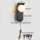 Axyaa White Glass Ball LED Wall Sconce Black Travertine Light Fixture