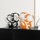 Axyaa Geometric Striped Vase with Abstract Handle for Stylish Home Decor